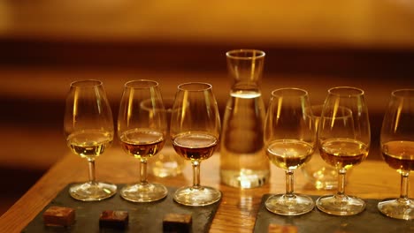 a whisky tasting setup with multiple glasses