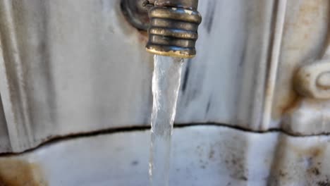 antique water fountain tap