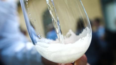 close-up of pouring champagne in slow motion