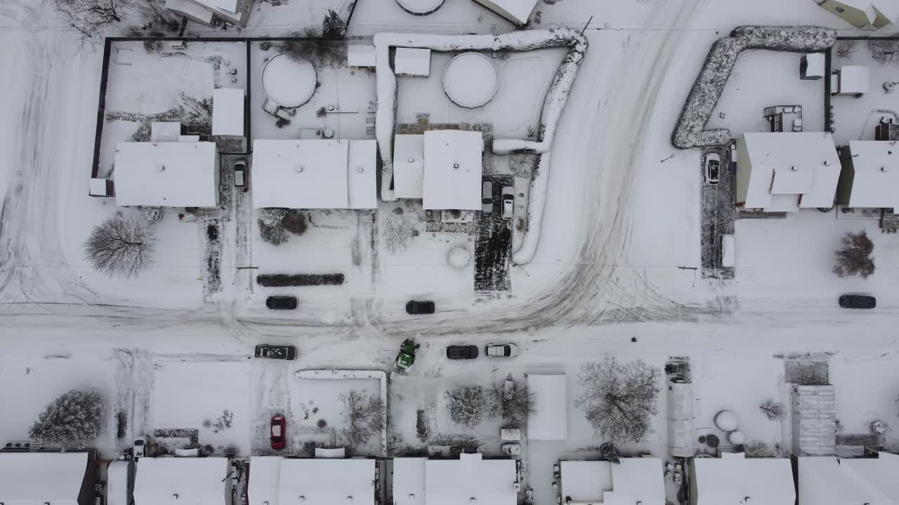 Suburb estates covered in snow in Canada, aerial top down view