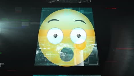 múltiples pantallas con procesamiento de datos contra emoji de cara sorprendida en fondo negro