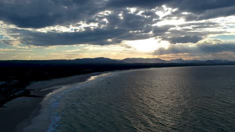 aerial view of sunset over the beach in byron bay, new south wales, australia