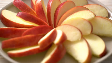 fresh-red-apple-slice-on-plate