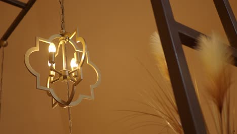 gold chandelier with geometric design