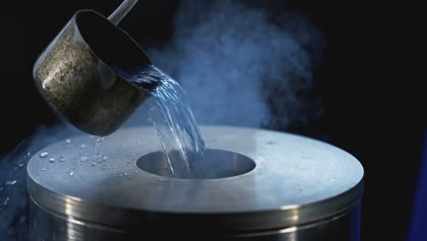 pouring liquid nitrogen into a container