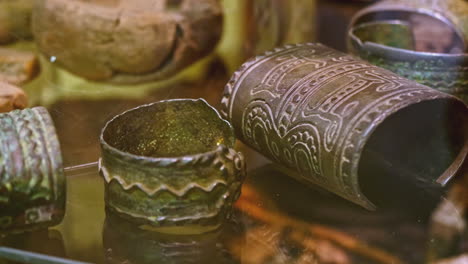 ancient bronze bracelets and arm guards