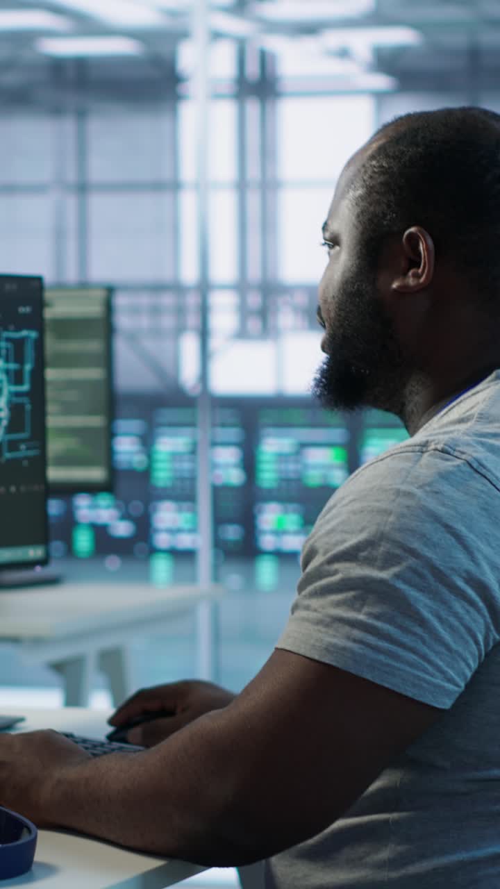 African American Man Working on Computer in Modern Tech Office