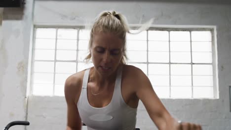 front view of an athletic caucasian woman exercising