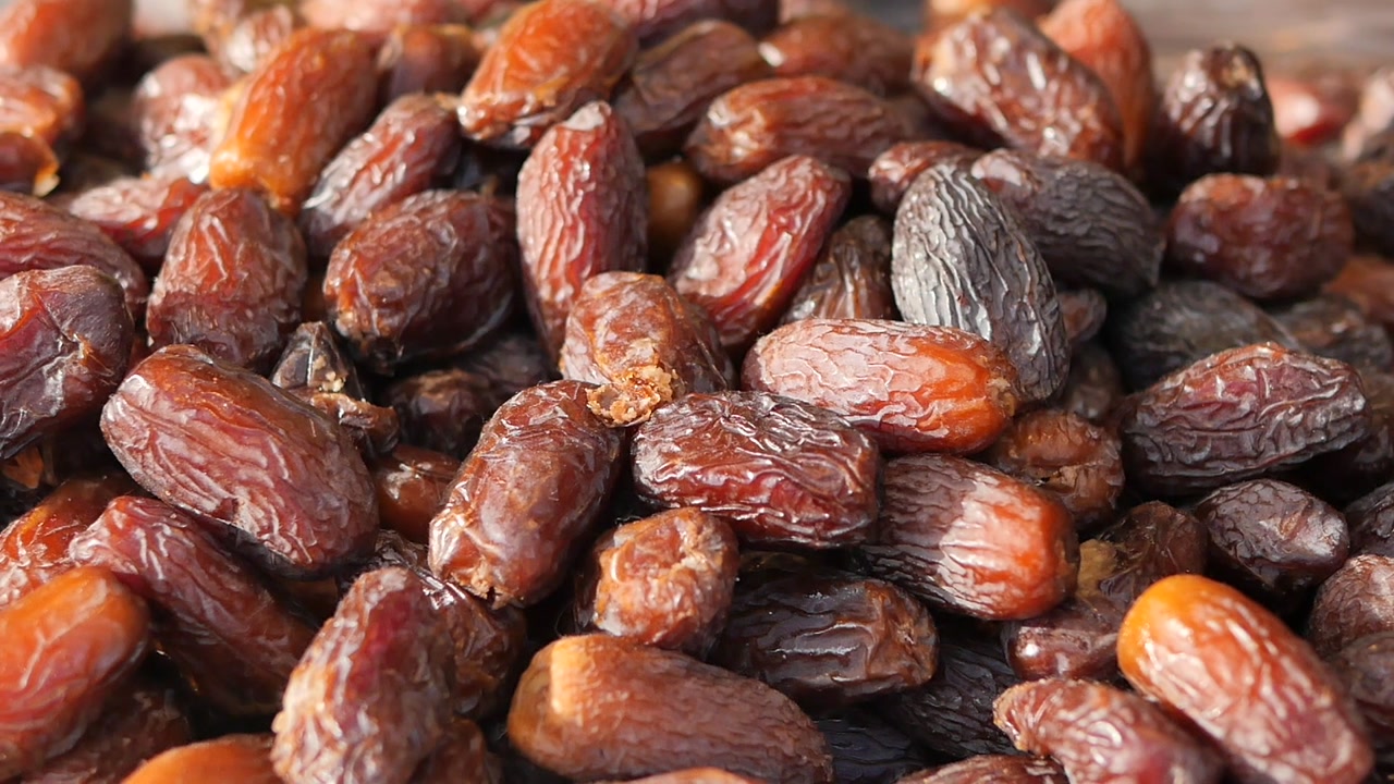 Close-up View of a Large Pile of Dried Dates