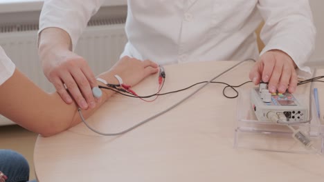 patient nerves testing using electromyography at medical center