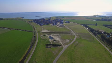 Aerial-shots-of-a-new-neighborhood-near-the-sea-in-Kruiningen,-the-Netherlands