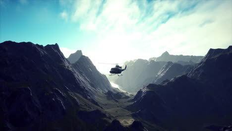 helicopter flying over a mountain valley