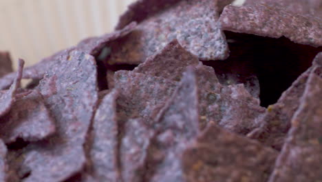 close up pan across a bowl of blue nachos