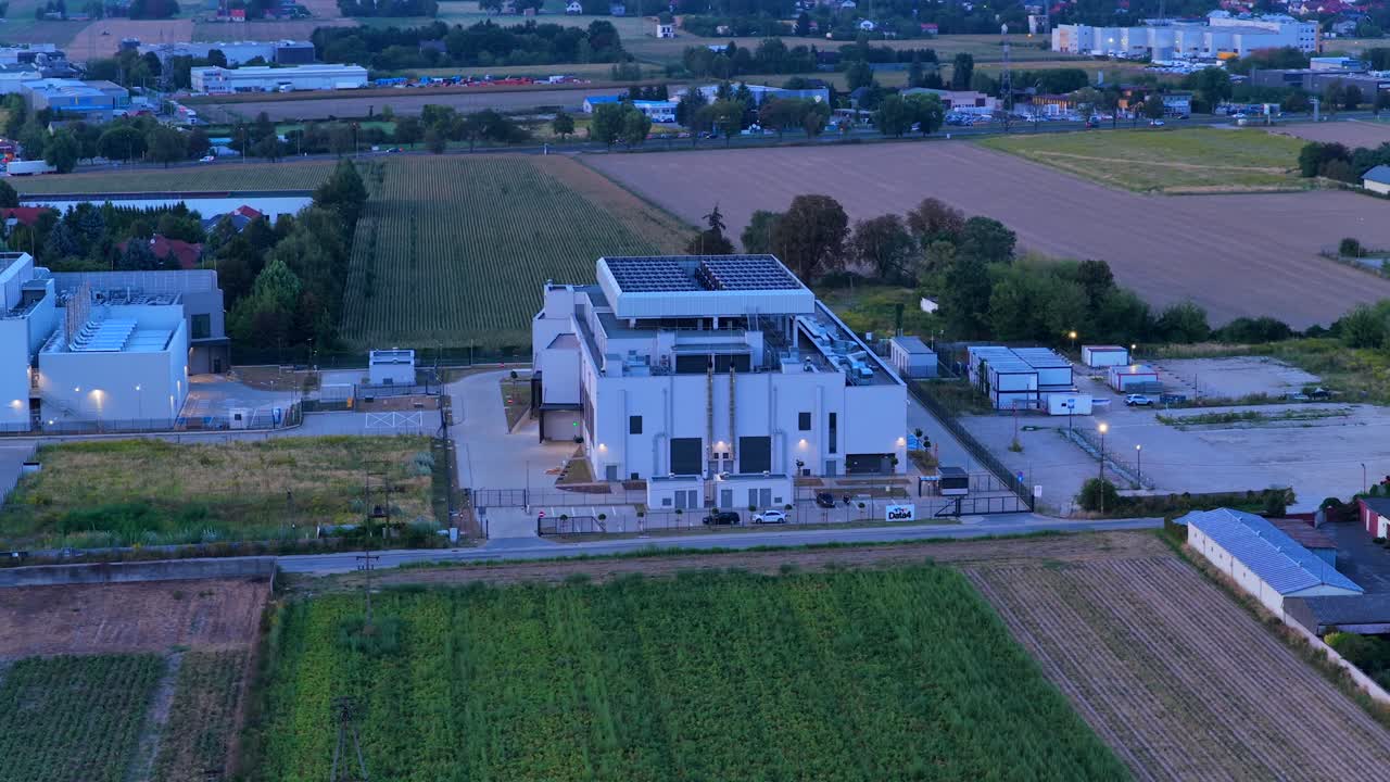 Aerial view of a modern data center in Warsaw, Poland, at dusk