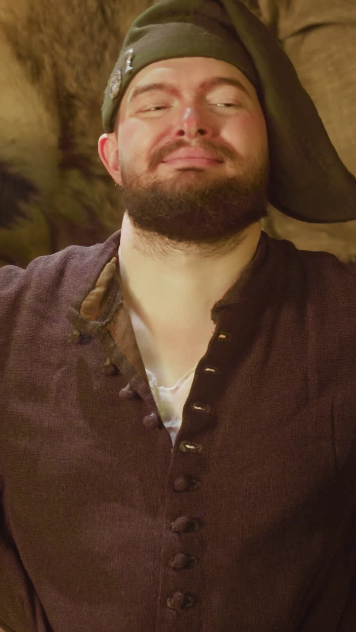 Positive bartender serves beer to guests in tavern. Cheerful servant gives large mugs with local beverages to men in medieval inn. Fantasy tale pub