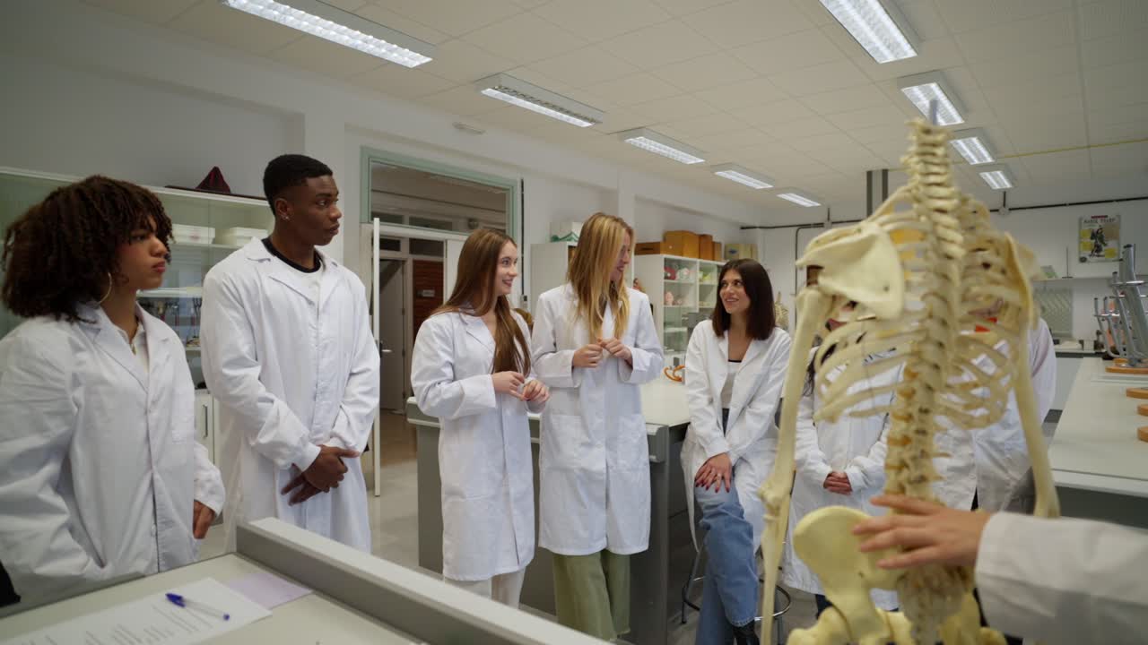 Students in a Science Lab Studying a Skeleton