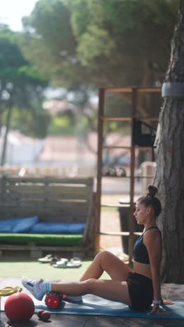 woman outdoors stretching