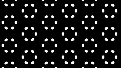 graphic pattern in black and white with stroboscopic and hypnotic effect, while increasing in size and then reducing it.