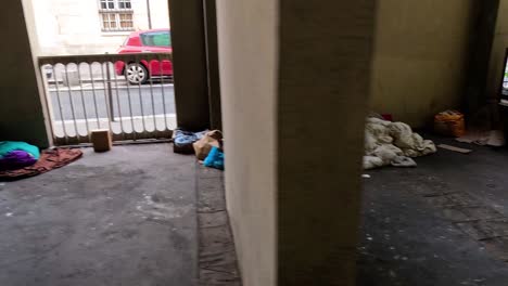 a homeless person's makeshift shelter in paris alleyway