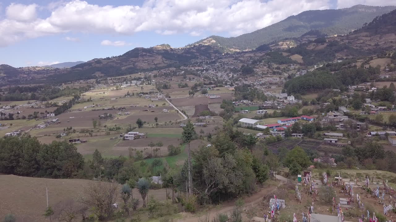 A drone flying towards the mountains in Michoac&aacute;n, Mexico