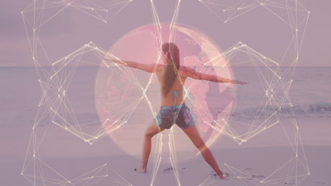 animation of globe and connections over caucasian woman practicing yoga at sea