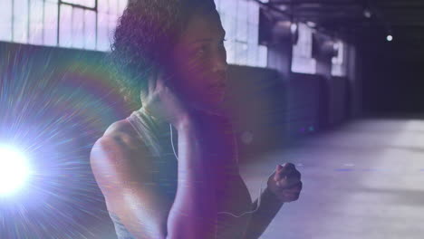 animation of glowing light over woman putting earphones on before workout in gym