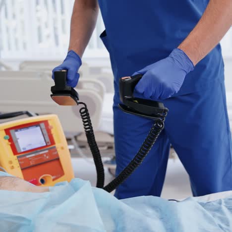 reanimation of patient with defibrillator
