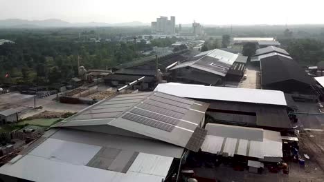 4k-Aerial-of-Warehouse-Solar-Rooftop,-Drone