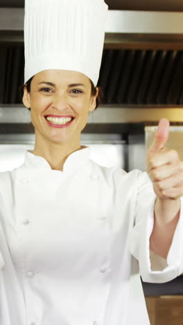 pretty chef showing thumbs up