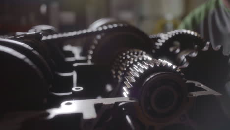 cogs and gears spinning in open engine