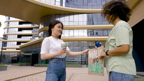 couple of female frieds outdoors in a protest