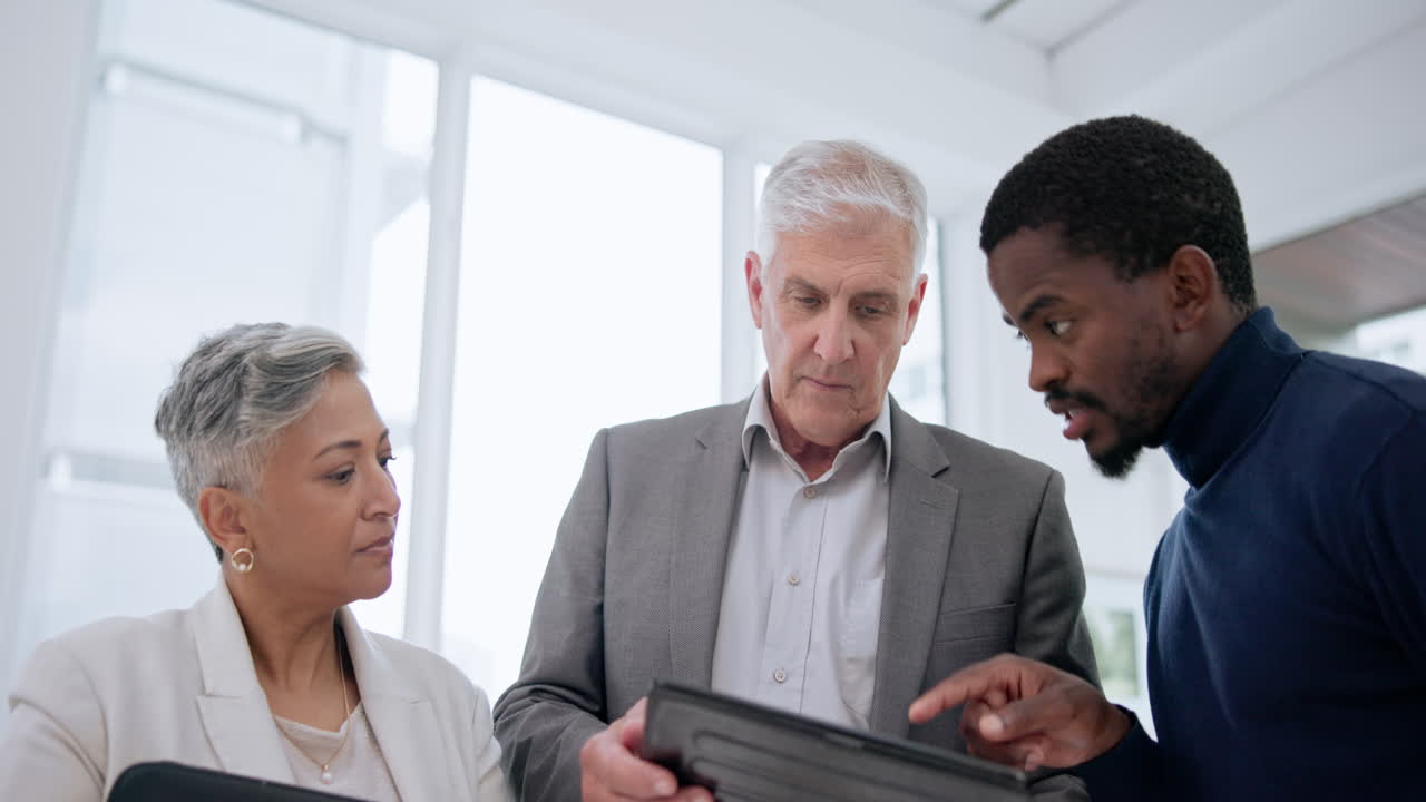 Teamwork, mentor and tablet with business people