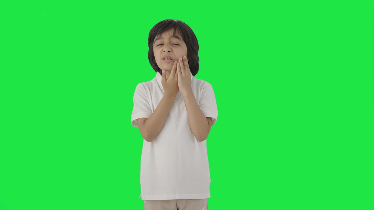 Sick Indian boy having a toothache Green screen | Premium Stock Video ...