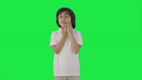 Sick-Indian-boy-having-a-toothache-Green-screen