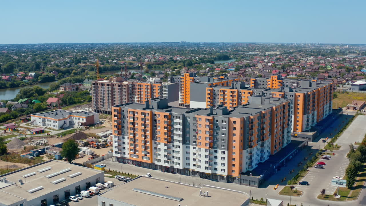 Exterior of the multistorey apartment. Aerial view of city residential area with high apartment buildings