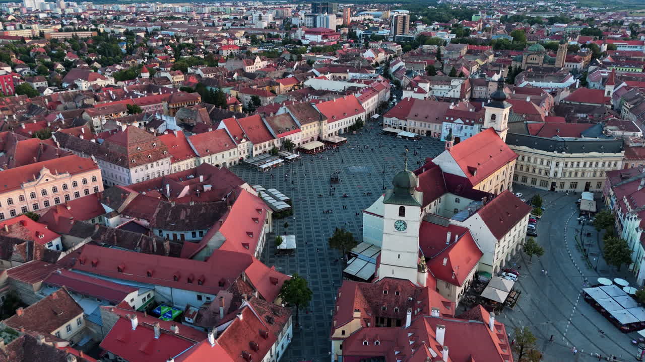 Aerial view of Sibiu's historic center, showcasing red-roofed buildings