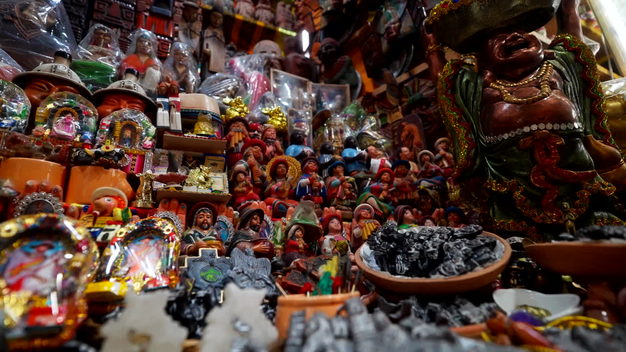Close up to souvenir shop stock with crafted statues. Spiritual. Witches Market, La Paz, Bolivia