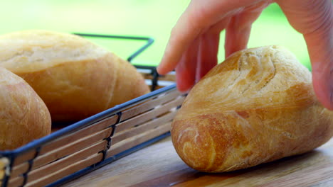 detail shot, cutting baguette bread