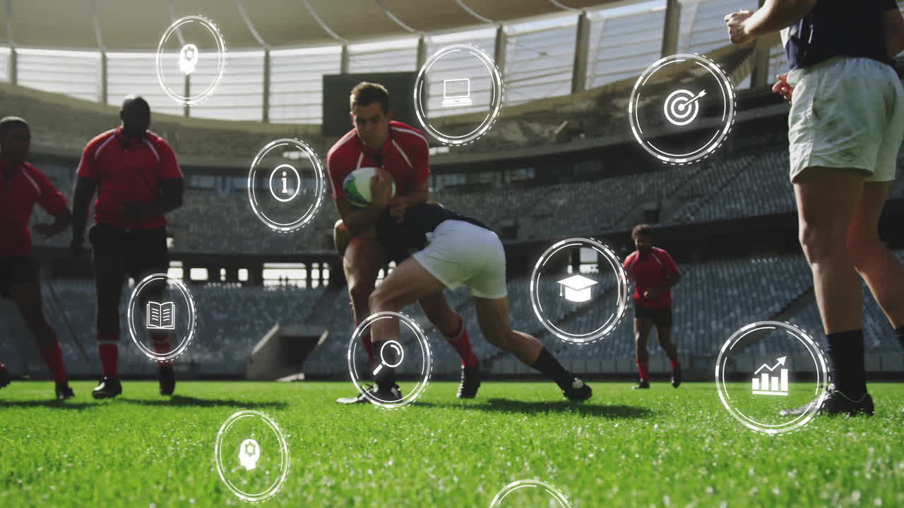 On field, rugby players tackling with animation of digital icons overlaying scene