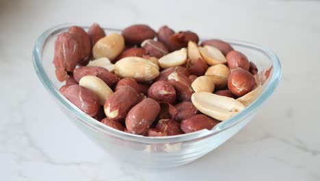 peanuts in a glass bowl