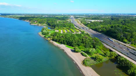 aerial of charles daley park beach on lake ontario along queen elizabeth way