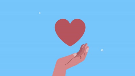la mano con el corazón animación de amor