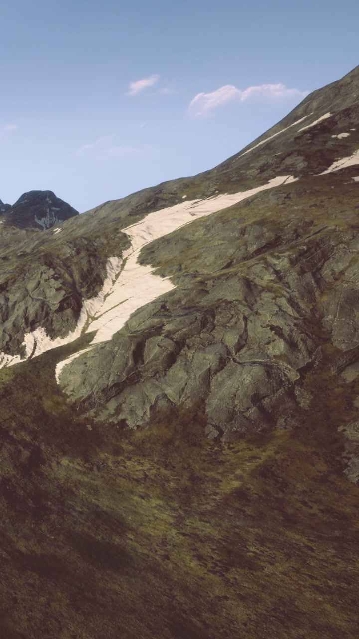 Majestic mountain landscape with rocky terrain and gentle slopes at sunset