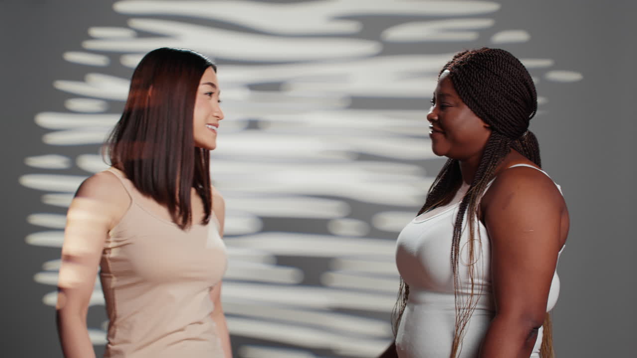 Diverse women smiling together