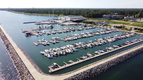 Many-sailboats-and-yachts-in-Haven-Kakumae,-aerial-drone-view