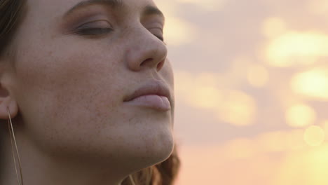 close-up-portrait-beautiful-red-head-woman-meditating-at-sunset-praying-exploring-spiritual-lifestyle-enjoying-mindfulness