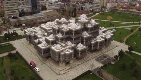 pristina, kosovo white library parallax drone shot