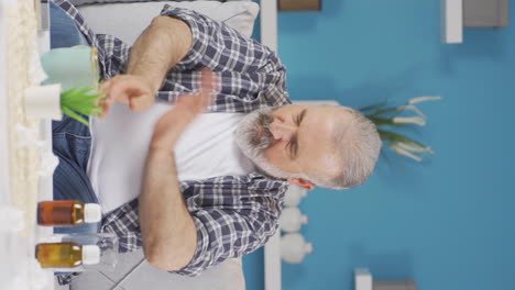 Vertical-video-of-Sick-old-man-with-skin-rash-problem.