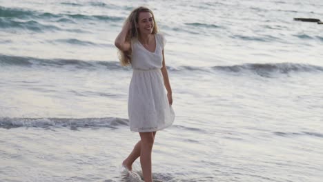 Caucasian-woman-enjoying-her-time-seaside