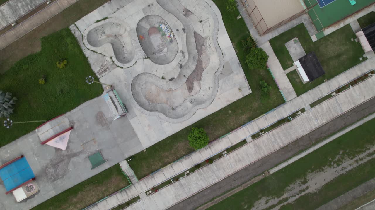 Aerial view of an urban skatepark in a sports complex, vibrant city vibe